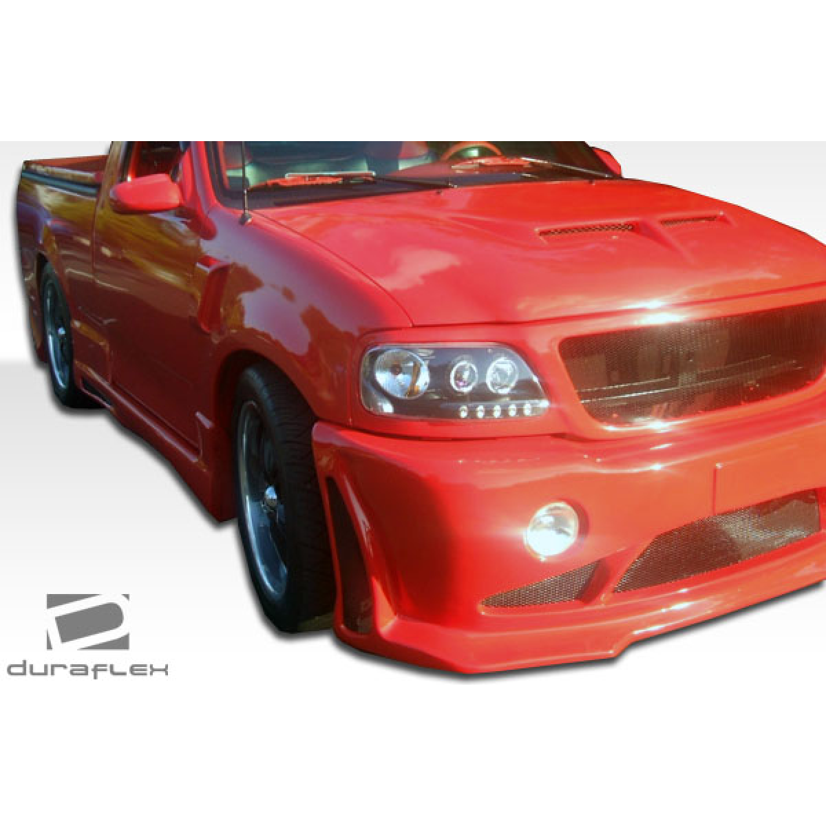 Modify your Ford F-150 1997 with our Exterior/Complete Body Kits - Front view angle of a modified red pickup truck