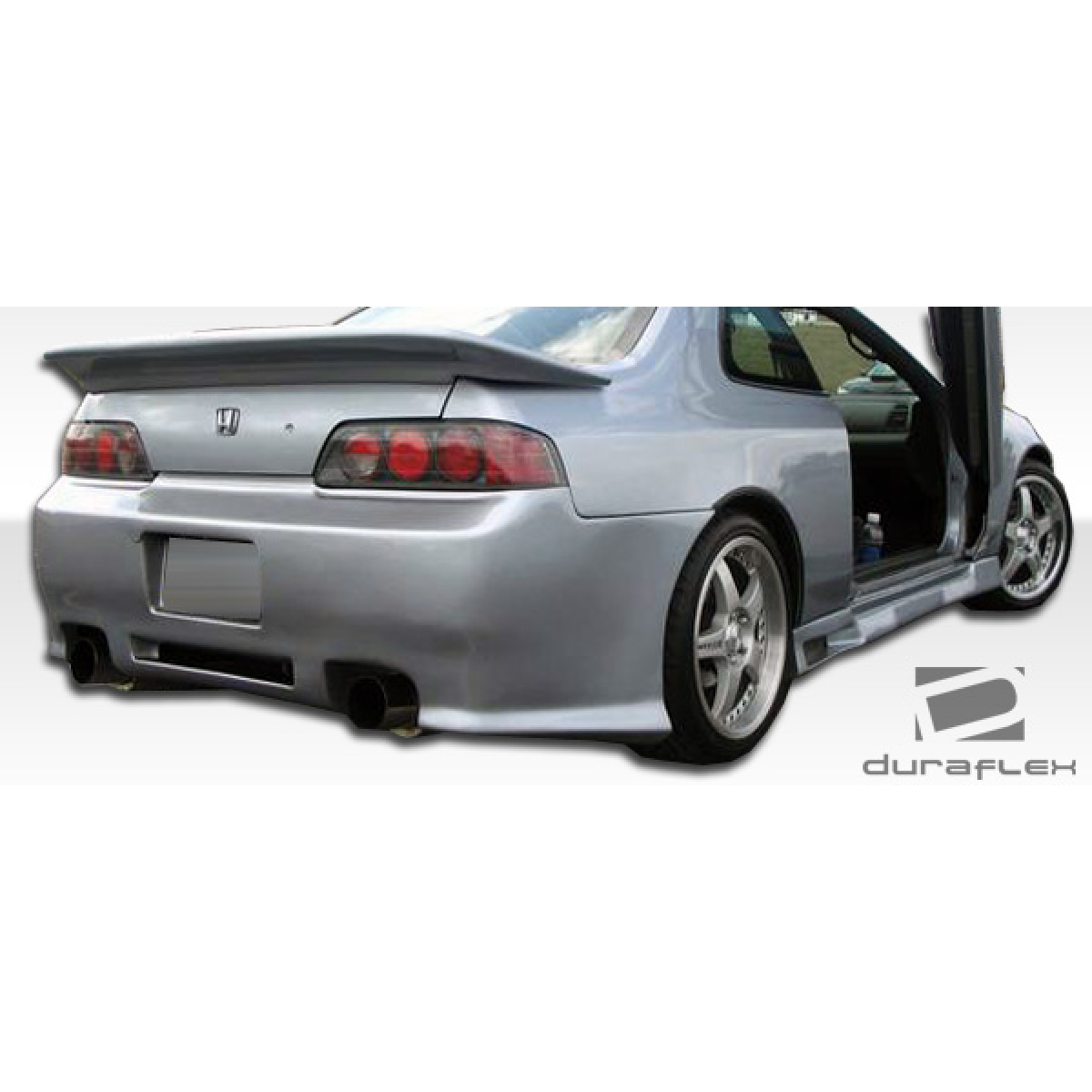 Modify your Honda Prelude 1997 with our Exterior/Rear Bumpers or Lips - Rear three quarter angle view of the vehicle