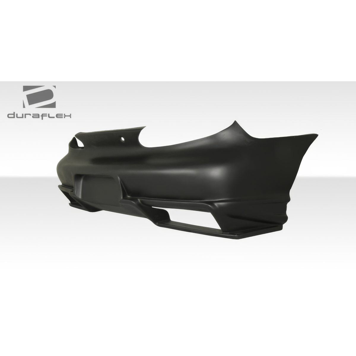 Modify your Hyundai Tiburon 1997 with our Exterior/Rear Bumpers or Lips - Side angle view of the rear bumper