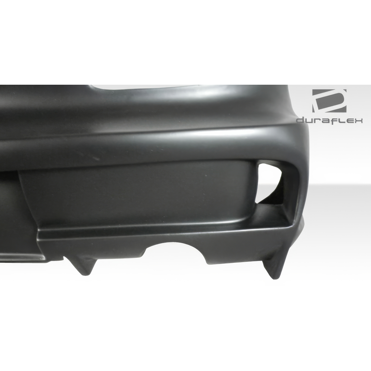 Modify your Hyundai Tiburon 1997 with our Exterior/Rear Bumpers or Lips - Angled view of rear bumper part from side