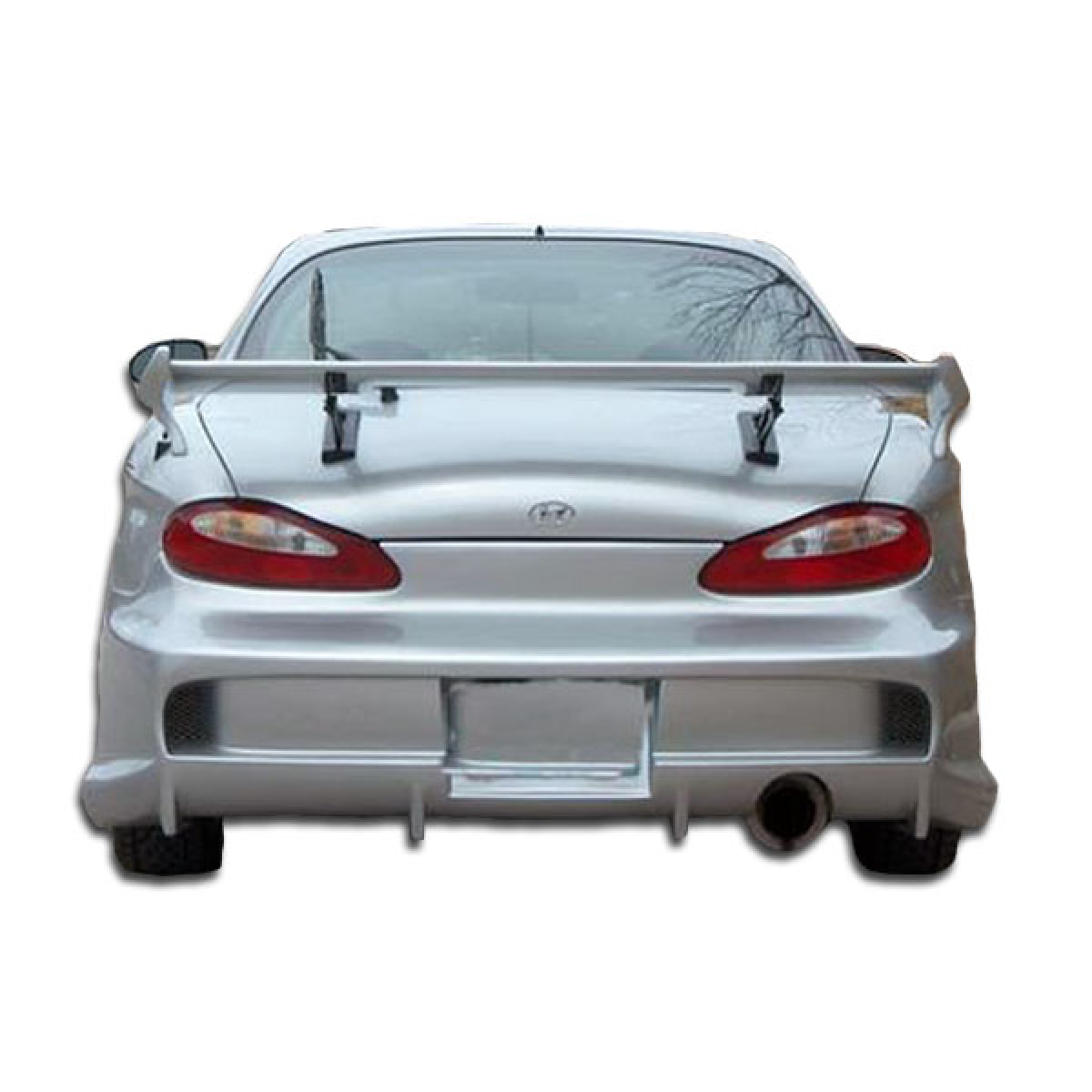 Modify your Hyundai Tiburon 1997 with our Exterior/Rear Bumpers or Lips - Rear view angle of the vehicle part