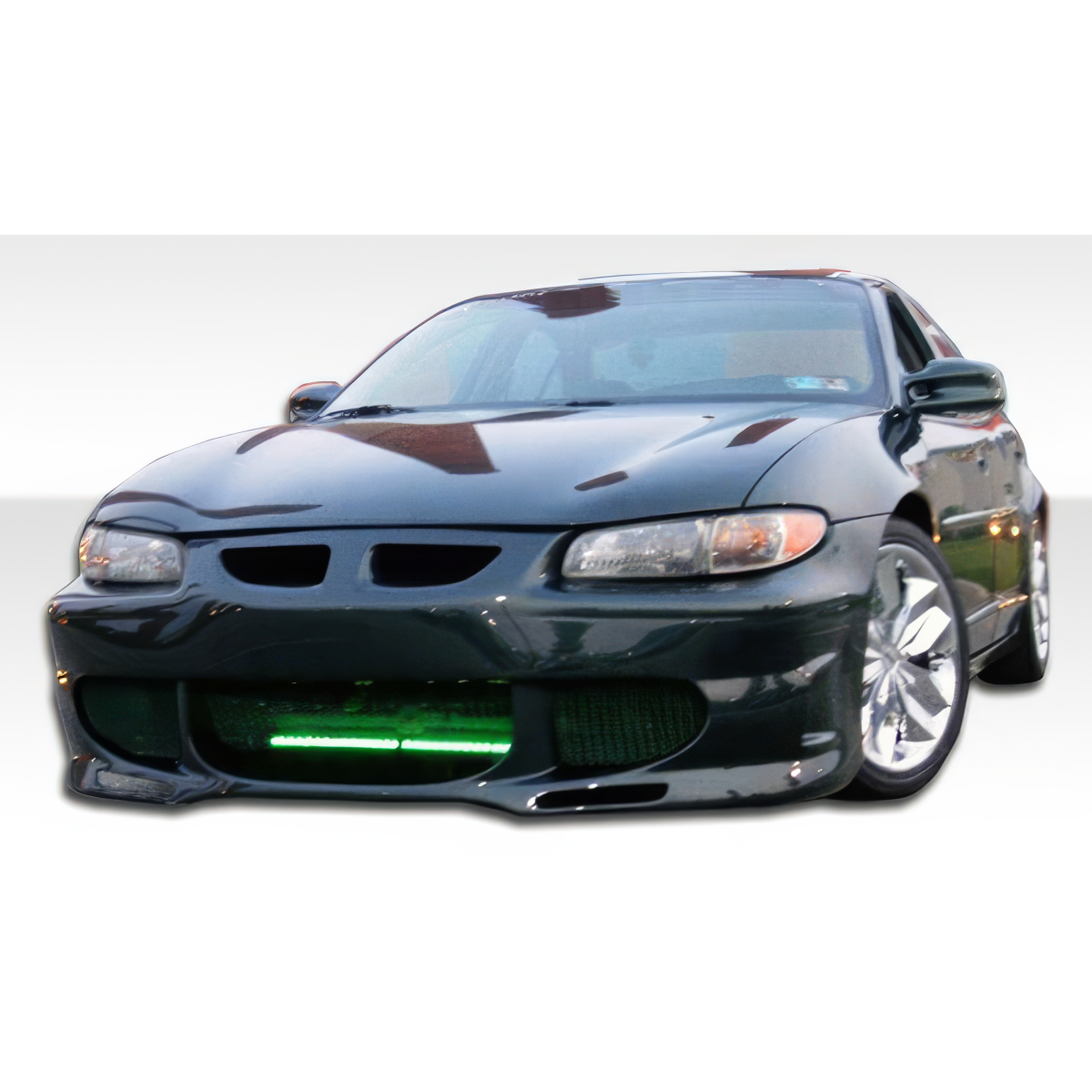 Modify your Pontiac Grand Prix 1997 with our Exterior/Complete Body Kits - Front angle view of car with aftermarket bumper