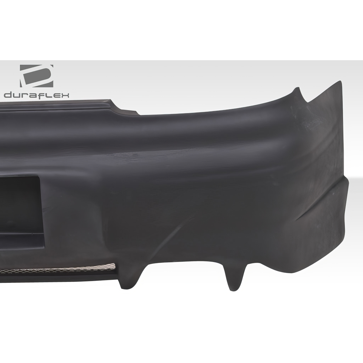 Modify your Pontiac Grand Prix 1997 with our Exterior/Rear Bumpers or Lips - The image shows a rear bumper side view angle