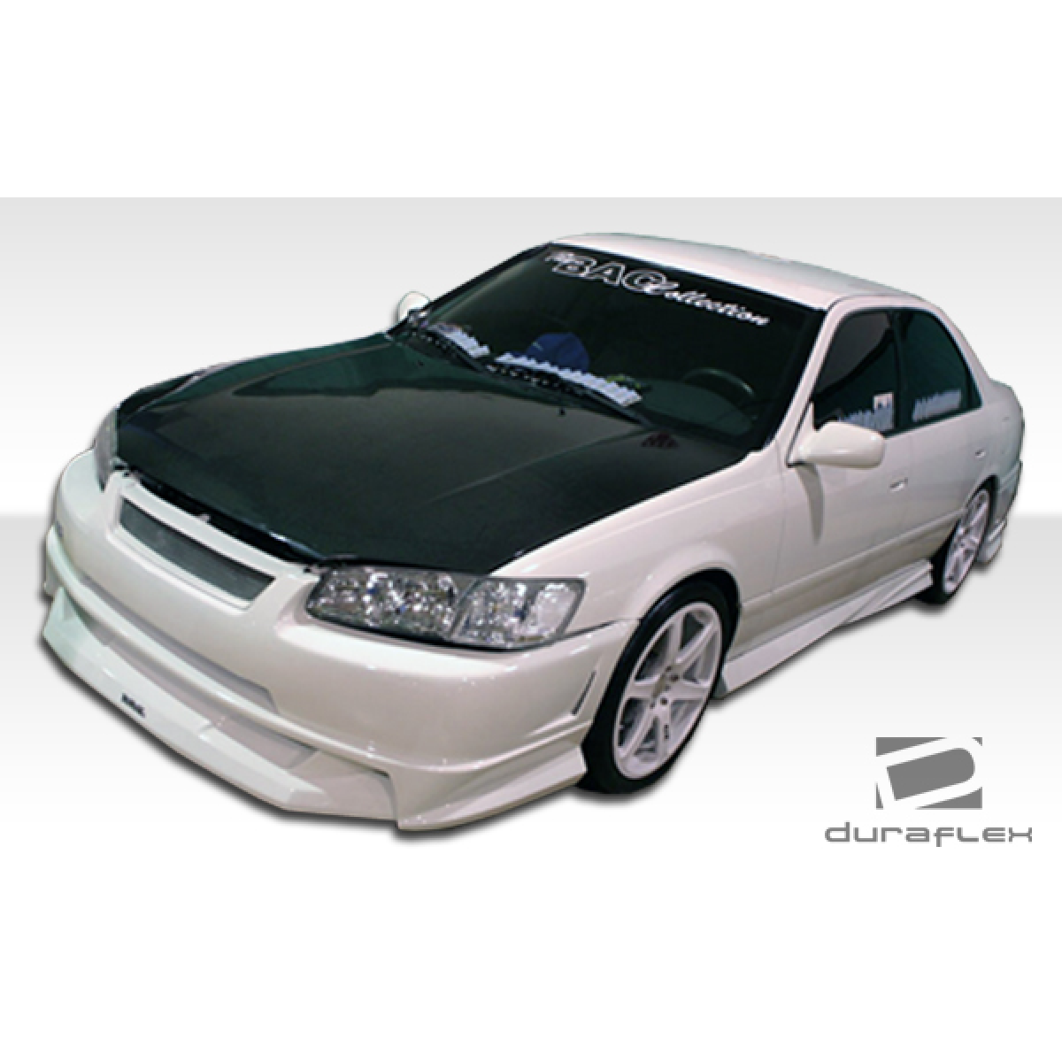 Modify your Toyota Camry 1997 with our Exterior/Side Skirts - Front angle view of modified Toyota Camry