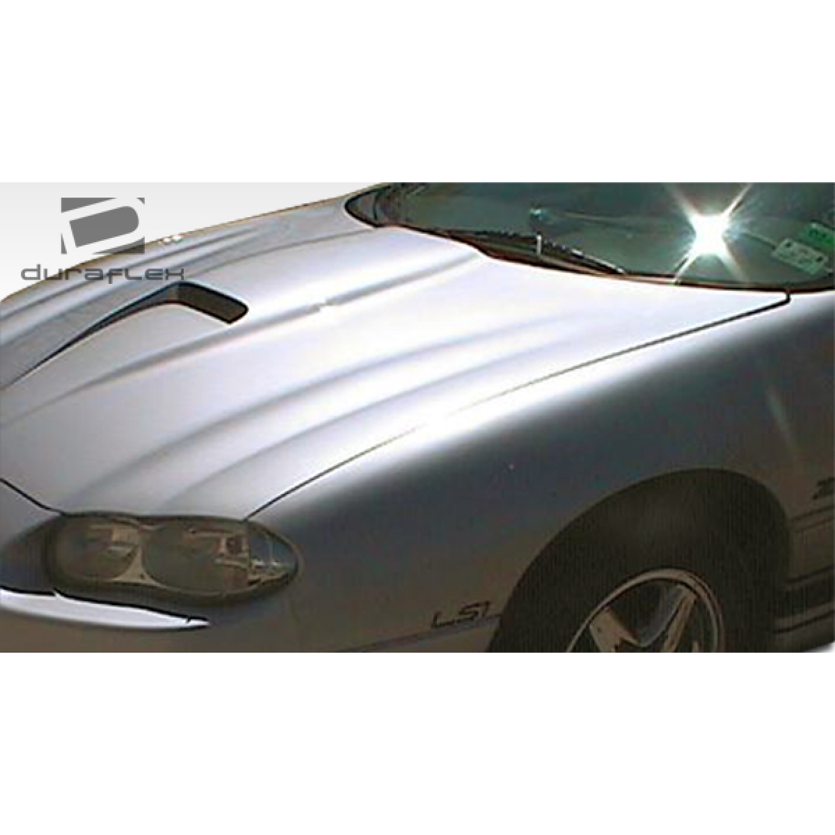 Modify your Chevrolet Camaro 1998 with our Exterior/Hoods - Viewing from an angle above and to the side