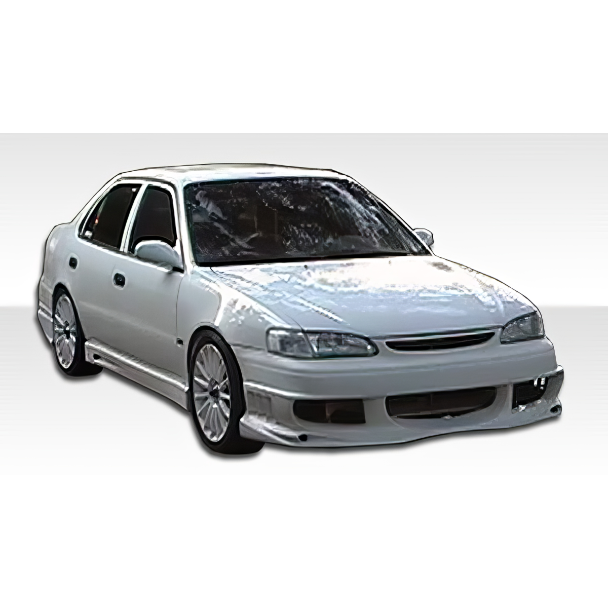Modify your Toyota Corolla 1998 with our Exterior/Front Bumpers - Front angle view of a modified white Toyota Corolla