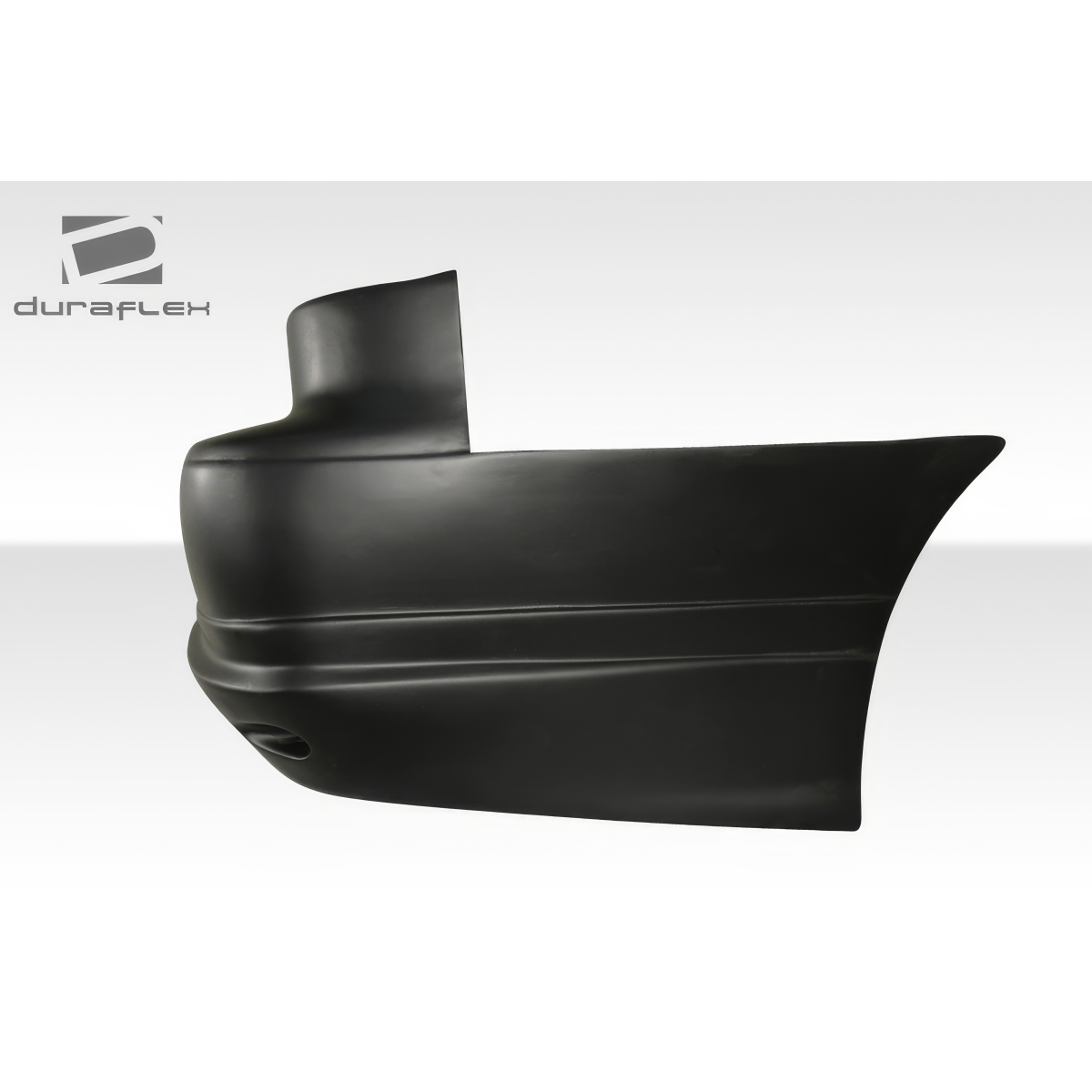 Modify your Toyota Corolla 1998 with our Exterior/Rear Bumpers - Side view angle showing rear bumper design