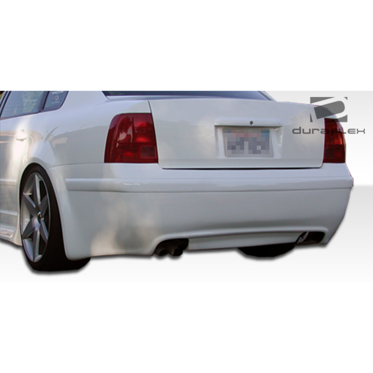 Modify your Volkswagen Passat 1998 with our Exterior/Rear Bumpers - Angle looking towards the rear right quarter