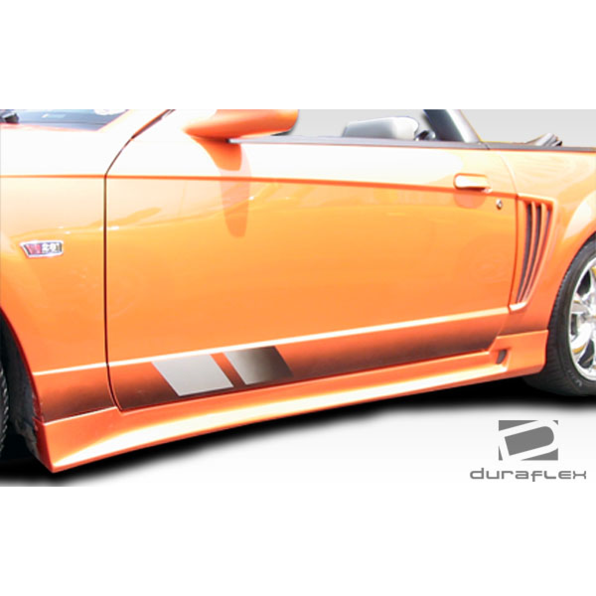 Modify your Ford Mustang 1999 with our Exterior/Side Skirts - Side view angle of side skirts on vehicle