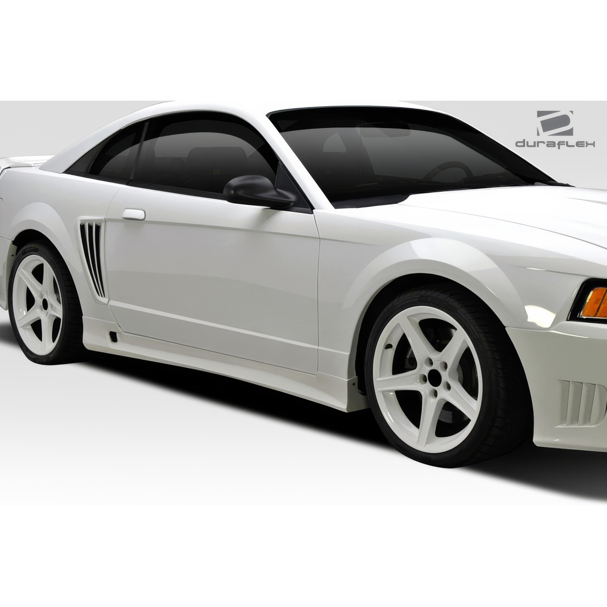 Modify your Ford Mustang 1999 with our Exterior/Side Skirts - Side view of vehicle showing skirts at a slight angle