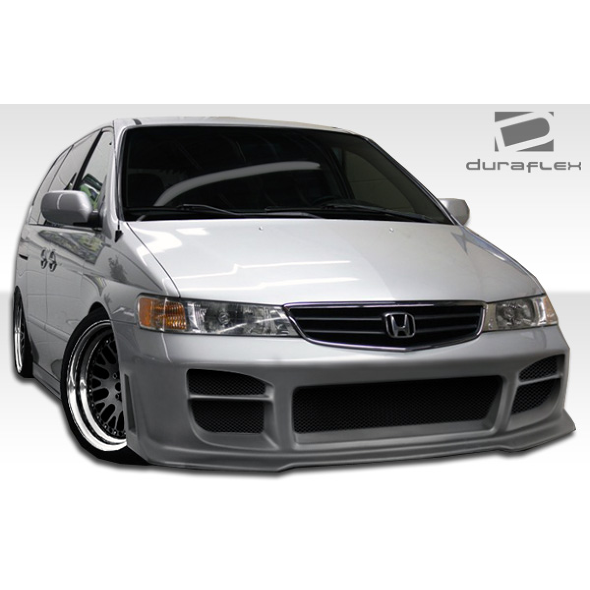 Modify your Honda Odyssey 1999 with our Exterior/Complete Body Kits - Front angle view of vehicle part