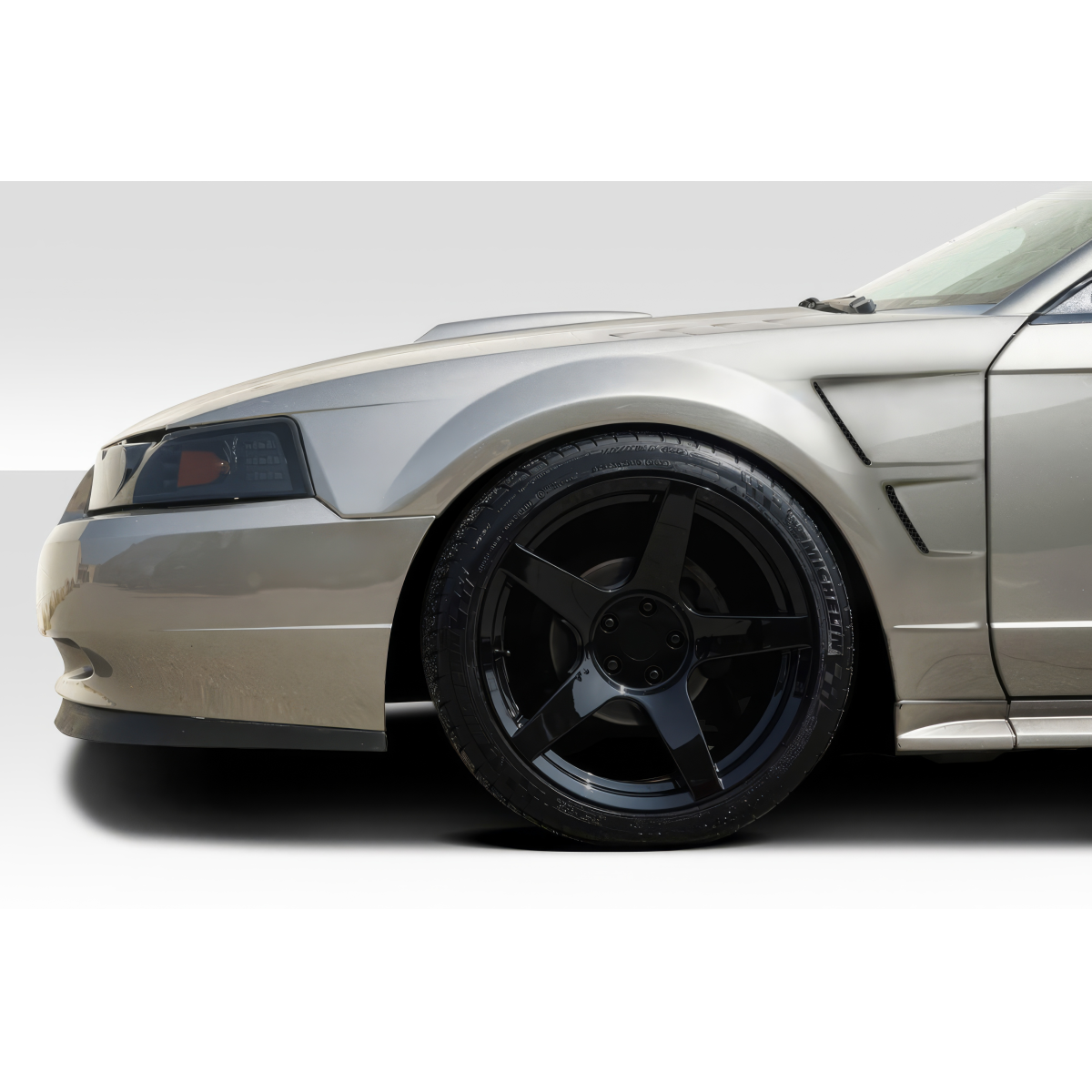 Modify your Ford Mustang 1999 with our Exterior/Fenders - Image captures front quarter angle of vehicle