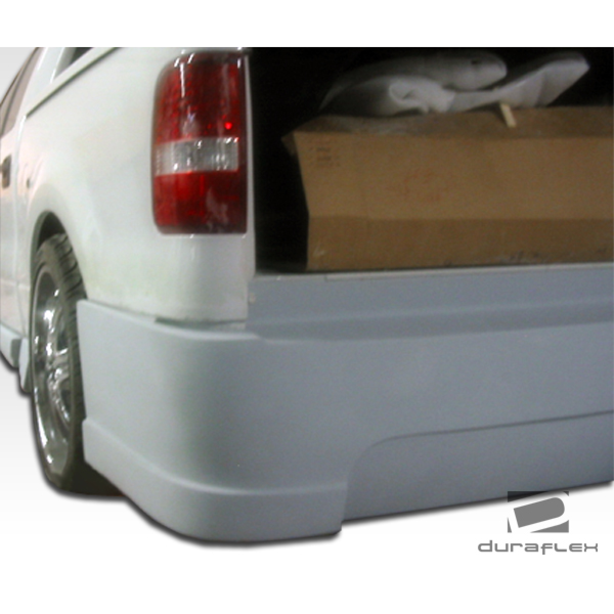 Modify your Ford F-150 2004 with our Exterior/Rear Bumpers or Lips - Rear angle showcasing bumper fitment and design