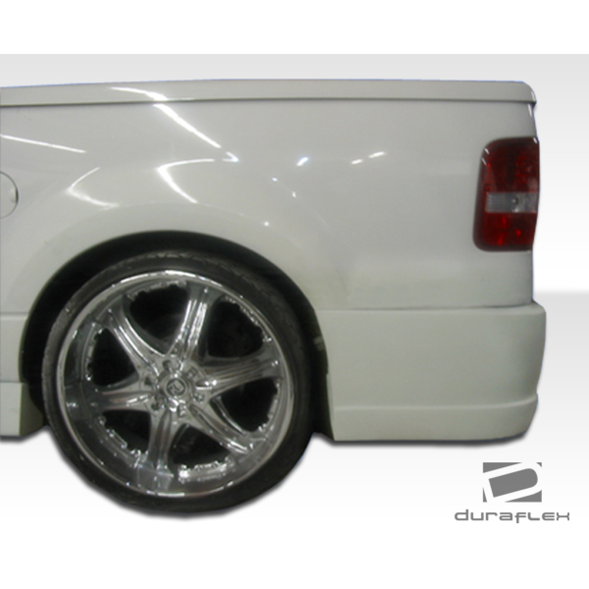 Modify your Ford F-150 2004 with our Exterior/Rear Bumpers or Lips - Side angle showing rear bumper and wheel detail