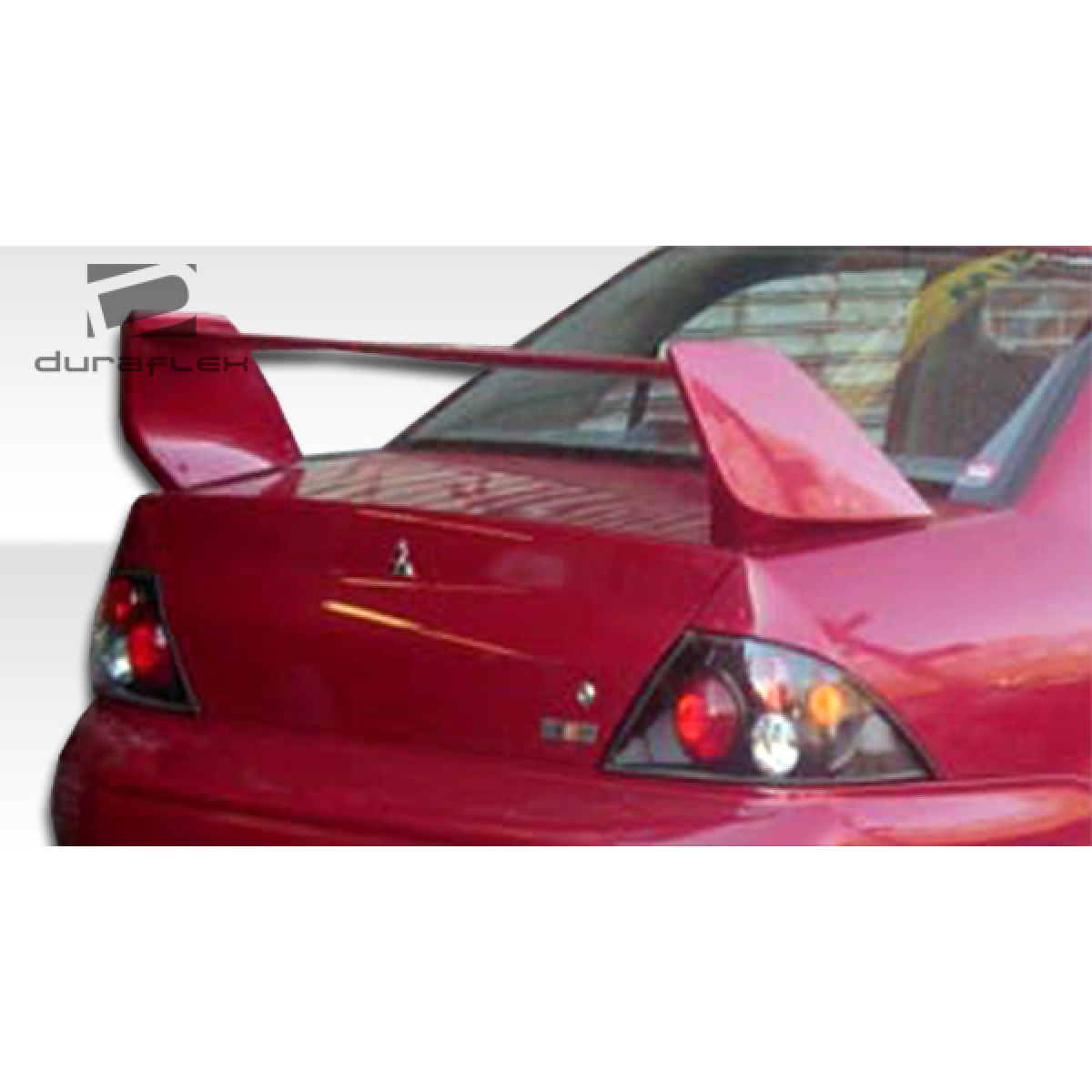 Modify your Mitsubishi Evolution 2002 with our Exterior/Wings - Rear view angle showing wing and trunk area