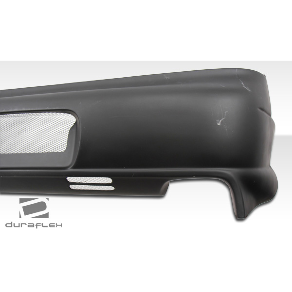 Modify your Mitsubishi 3000GT 1991 with our Exterior/Rear Bumpers or Lips - Side angle view of the rear bumper part