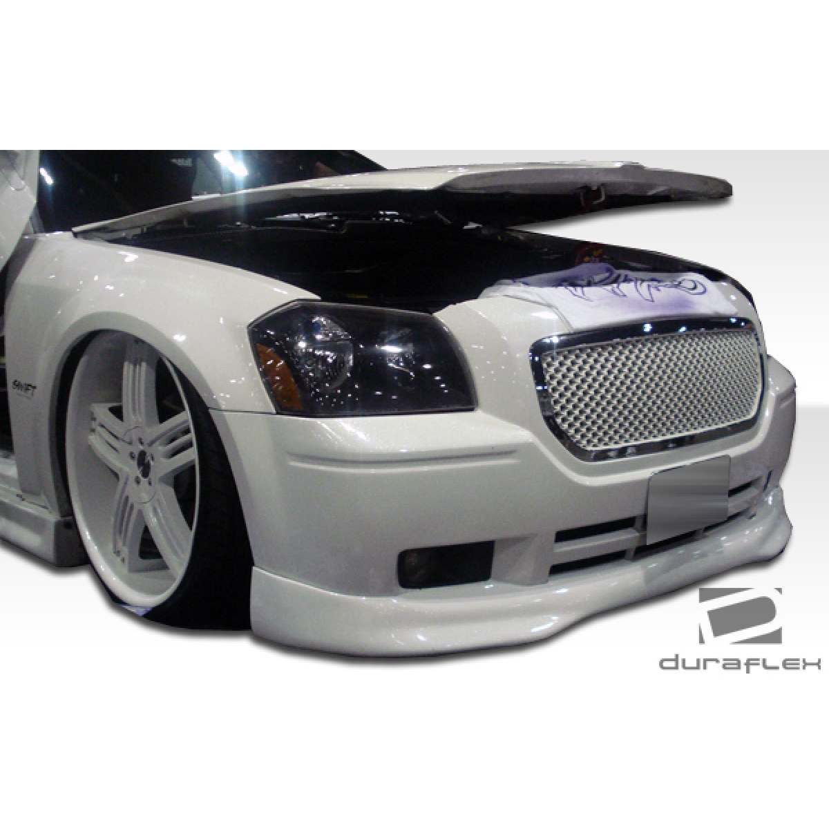 Modify your Dodge Magnum 2005 with our Exterior/Front Bumpers or Lips - Front angle showcasing the vehicle and part