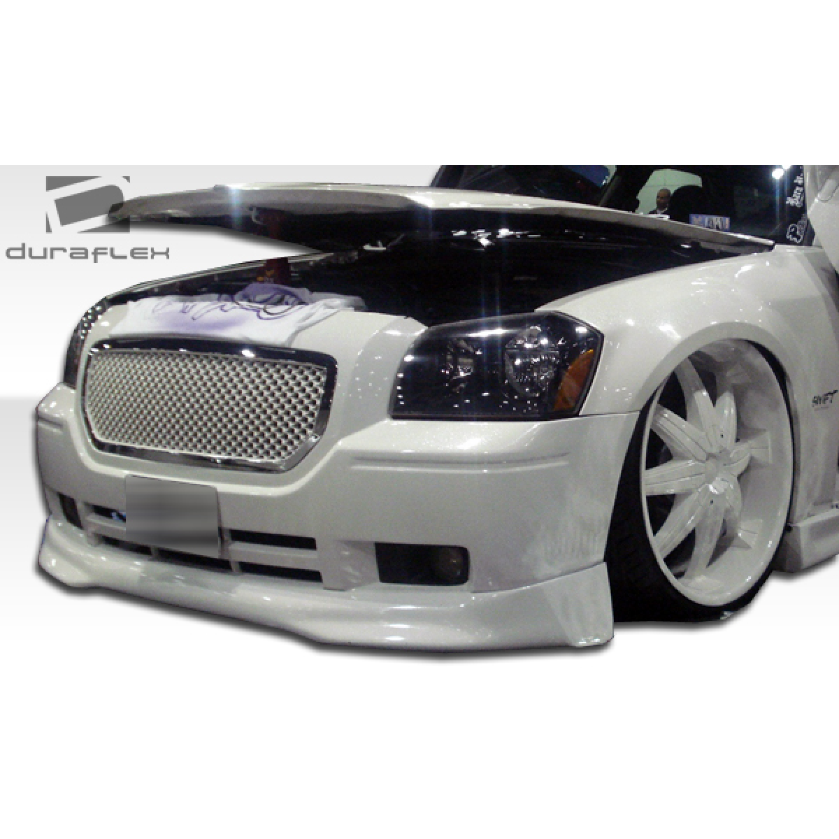 Modify your Dodge Magnum 2005 with our Exterior/Front Bumpers or Lips - Front angle view of modified Dodge Magnum