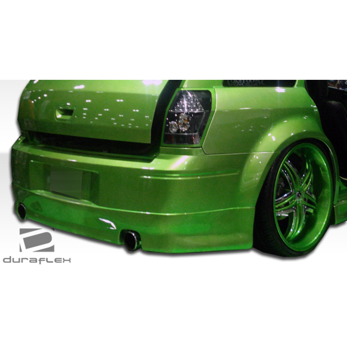 Modify your Dodge Magnum 2005 with our Exterior/Rear Bumpers or Lips - Rear angle of a Dodge Magnum with modified bumper