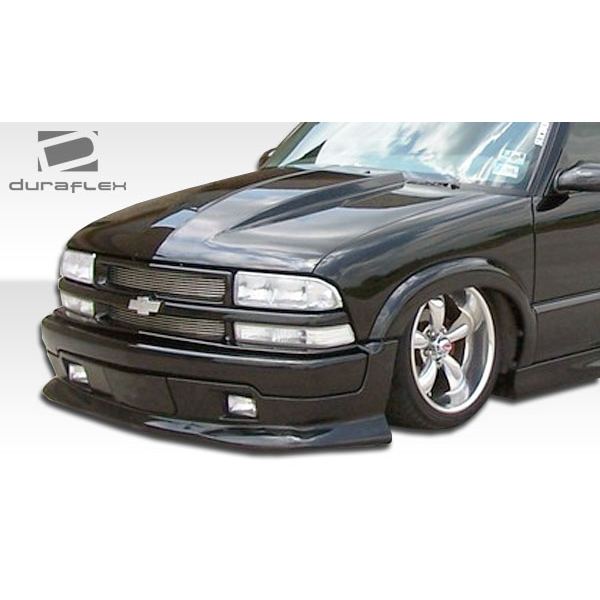 Modify your Chevrolet Blazer 1994 with our Exterior/Hoods - Front angle view of hood on a Chevrolet vehicle