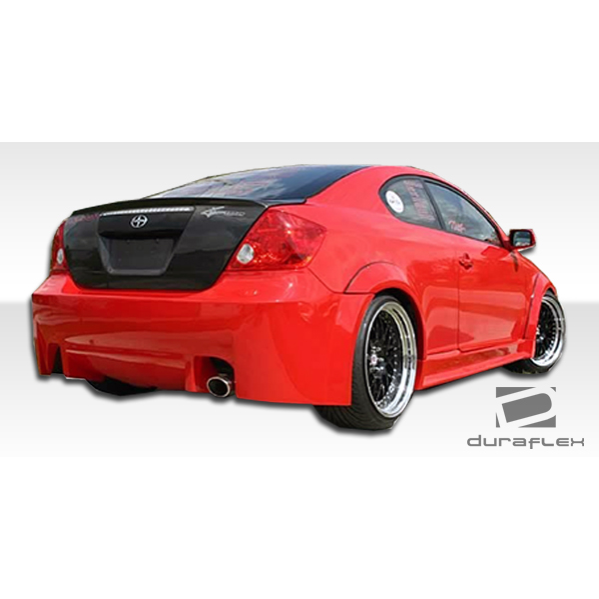 Modify your Scion tC 2005 with our Exterior/Complete Body Kits - Rear three quarter angle view of the vehicle