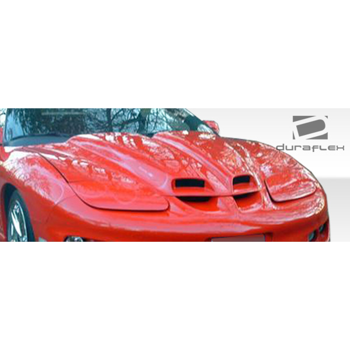 Modify your Pontiac Firebird 1998 with our Exterior/Hoods - Front angle view of hood on red sports car