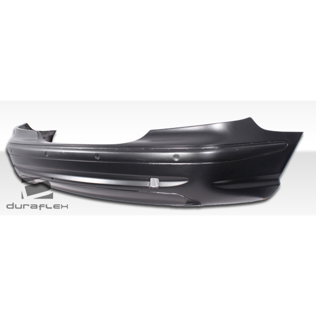 Modify your Mercedes-Benz CLK-Class 2003 with our Exterior/Rear Bumpers or Lips - Part is shown from a side angle