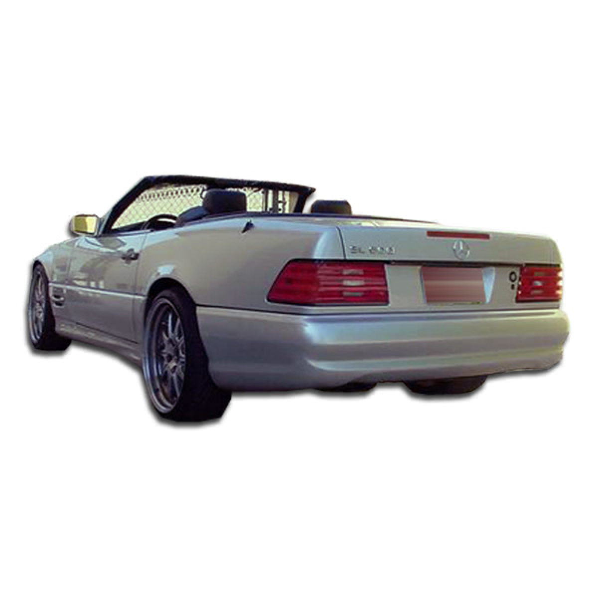 Modify your Mercedes-Benz SL-Class 1990 with our Exterior/Complete Body Kits - Rear angle view of a silver convertible car