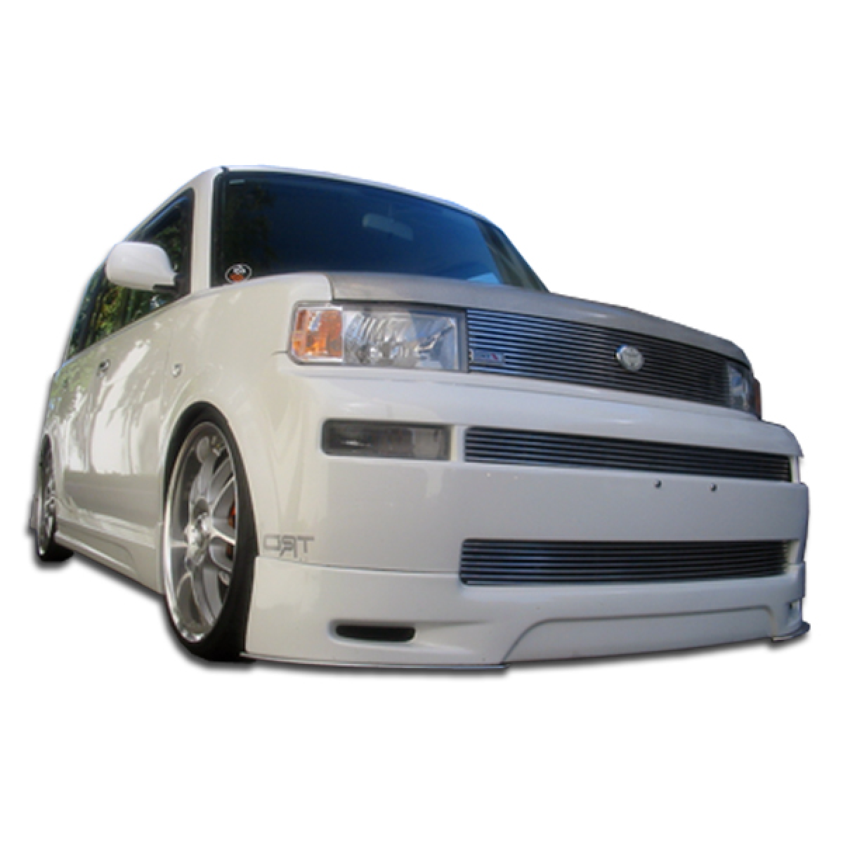 Modify your Scion xB 2004 with our Exterior/Complete Body Kits - Front angle view of Scion xB with front lip