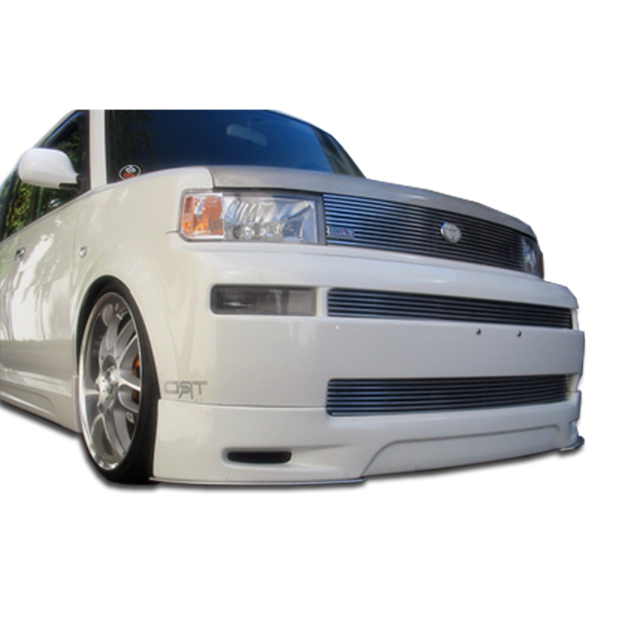 Modify your Scion xB 2004 with our Exterior/Complete Body Kits - Front view at a low angle