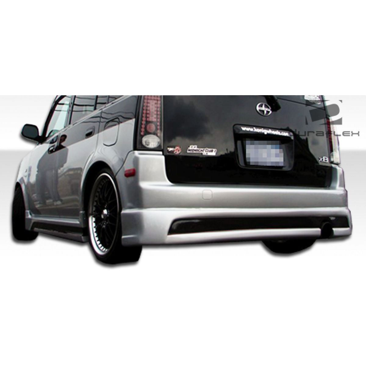 Modify your Scion xB 2004 with our Exterior/Complete Body Kits - Rear angle view of a rear lip under spoiler