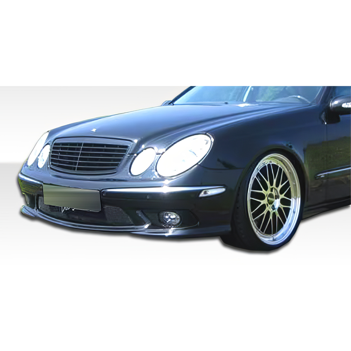 Modify your Mercedes-Benz E55 AMG 2003 with our Exterior/Front Bumpers or Lips - Front angle view of a Mercedes E55 AMG