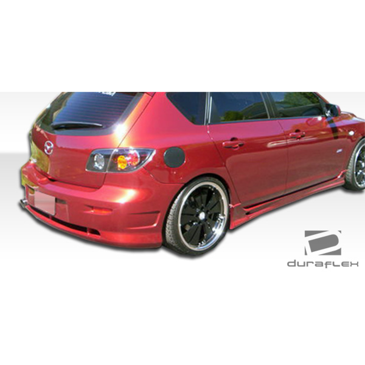 Modify your Mazda 3 2004 with our Exterior/Side Skirts - Three quarter rear view of the vehicle