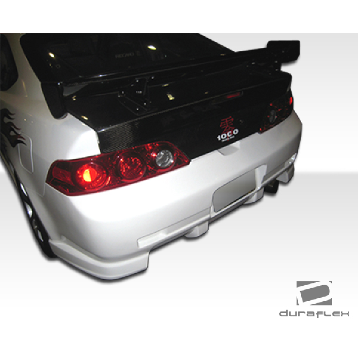 Modify your Acura RSX 2005 with our Exterior/Rear Bumpers or Lips - Rear angle showcasing bumper and wing design