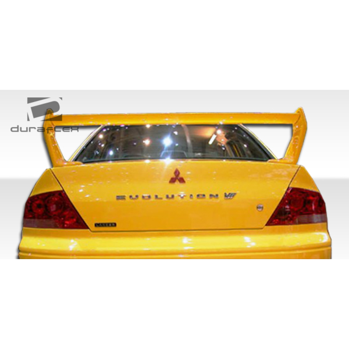 Modify your Mitsubishi Evolution 2002 with our Exterior/Wings - Rear angle view of vehicle with prominent wing