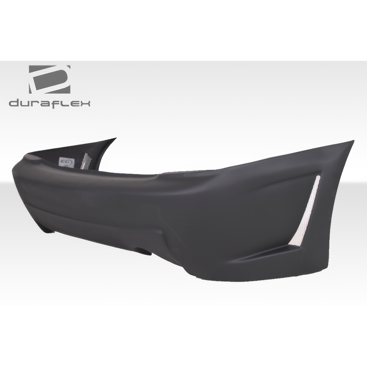 Modify your Mazda Protege 1999 with our Exterior/Rear Bumpers or Lips - Side angle view of rear bumper part