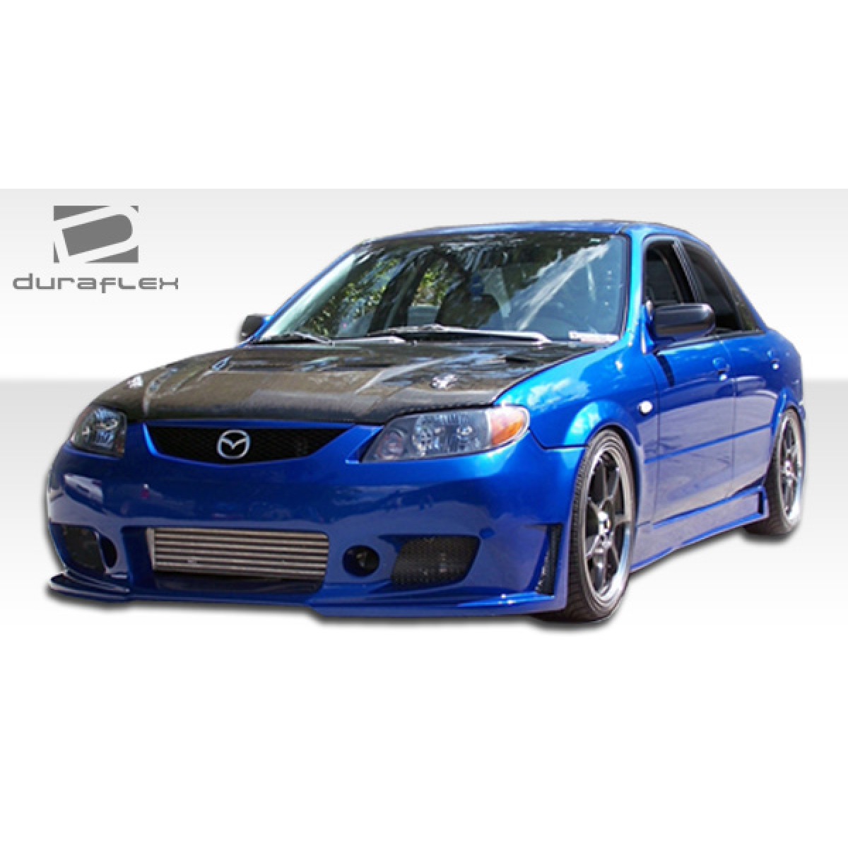 Modify your Mazda Protege 1999 with our Exterior/Side Skirts - Front three quarter angle view of the car