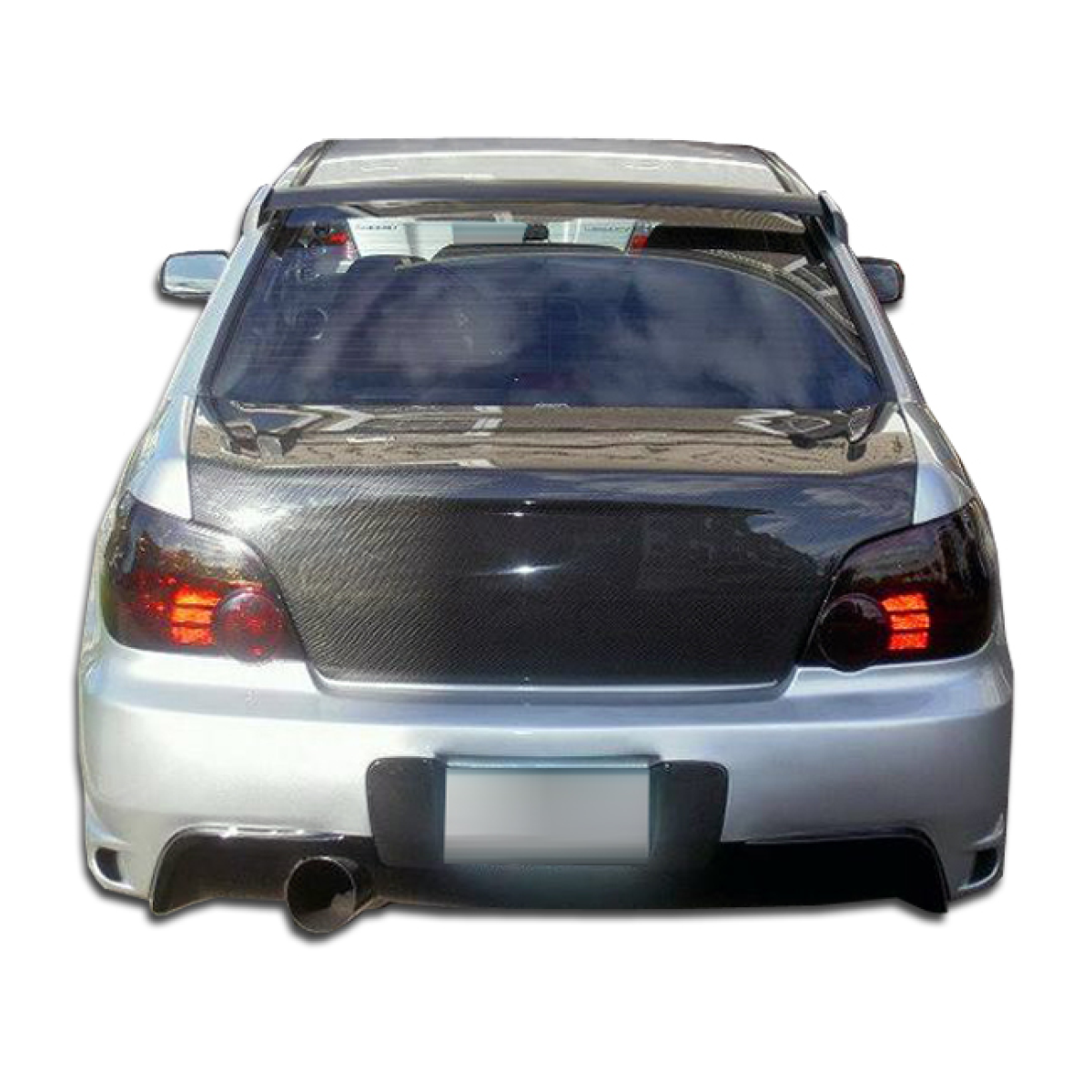 Modify your Subaru Impreza 2004 with our Exterior/Rear Bumpers or Lips - Rear angled view of a Subaru Impreza