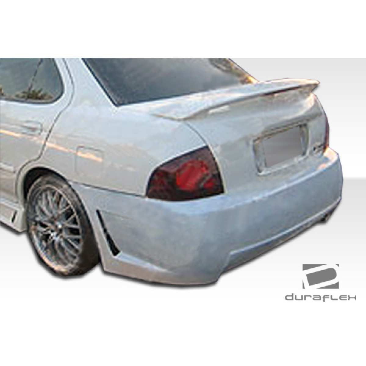 Modify your Nissan Sentra 2004 with our Exterior/Rear Bumpers or Lips - View of rear bumper at a slight angle from side