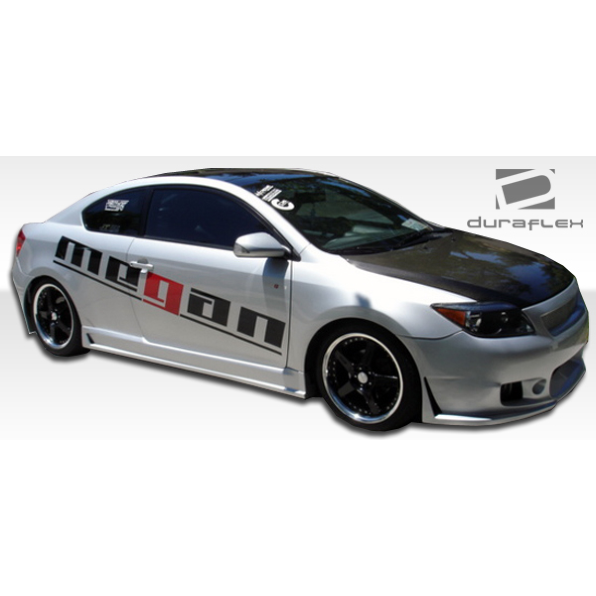 Modify your Scion tC 2005 with our Exterior/Front Bumpers or Lips - Side angle view of modified silver car