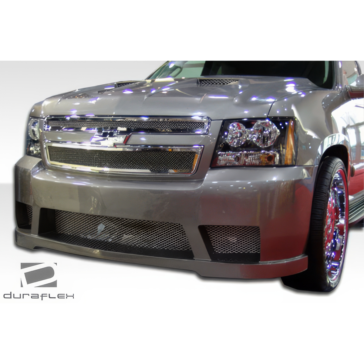 Modify your Chevrolet Avalanche 2007 with our Exterior/Hoods - Front view of vehicle part at low angle