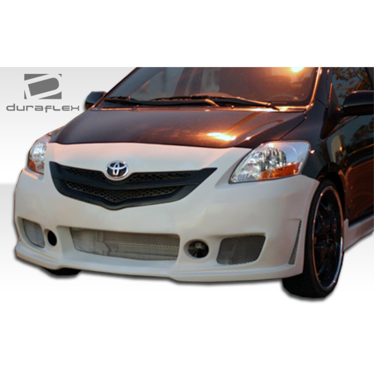 Modify your Toyota Yaris 2007 with our Exterior/Front Bumpers or Lips - Angle shows front view of bumper design