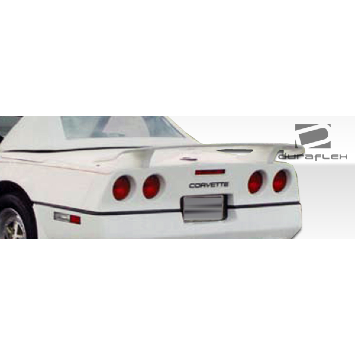 Modify your Chevrolet Corvette 1984 with our Exterior/Wings - Rear angle view of a Corvette trunk lid spoiler
