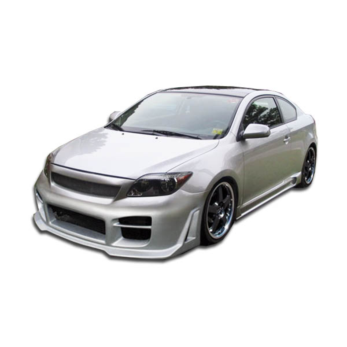 Modify your Scion tC 2005 with our Exterior/Complete Body Kits - Front angled view of silver Scion tC carrying bumper