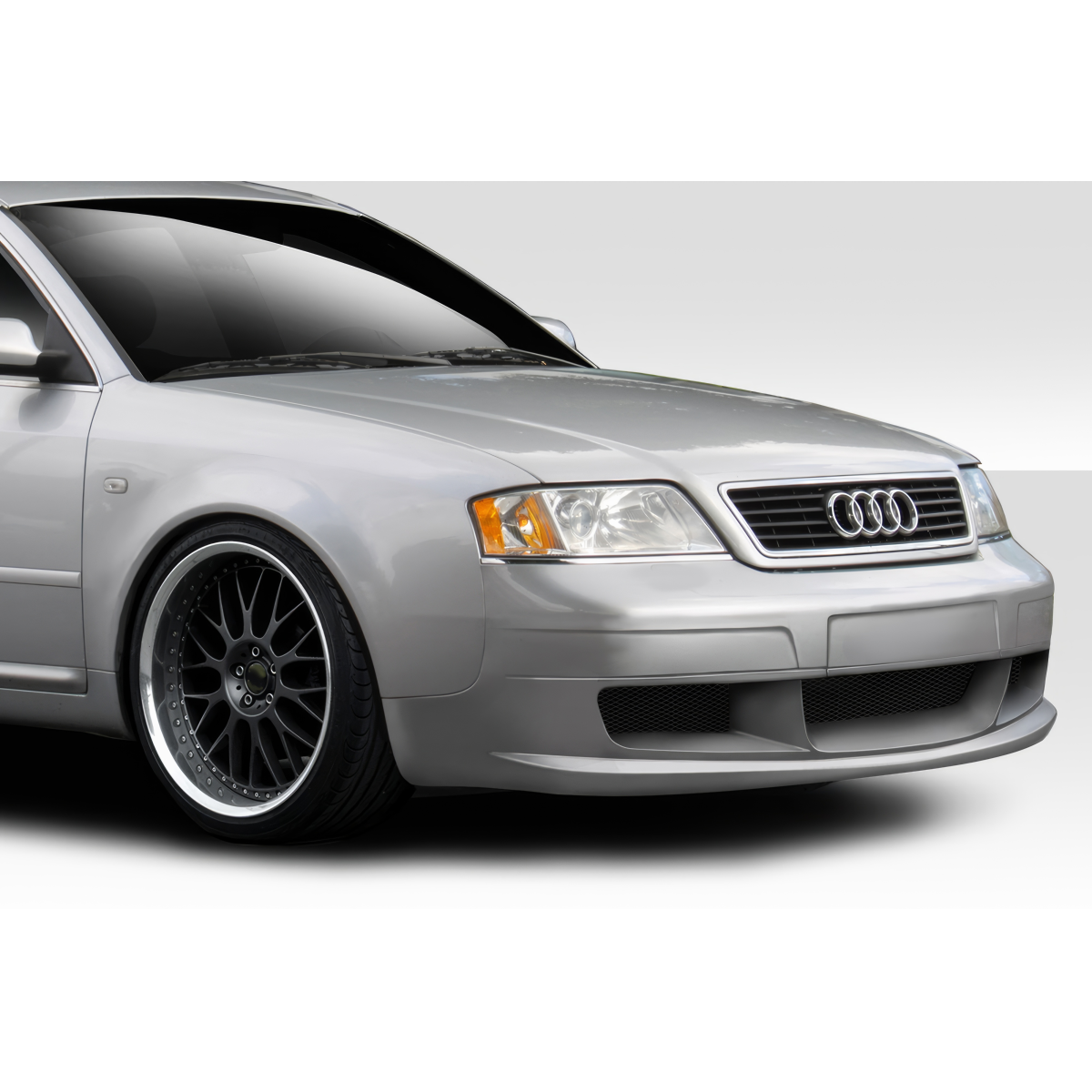 Modify your Audi A6 1998 with our Exterior/Front Bumpers or Lips - Angled view of the front bumper of the Audi A6