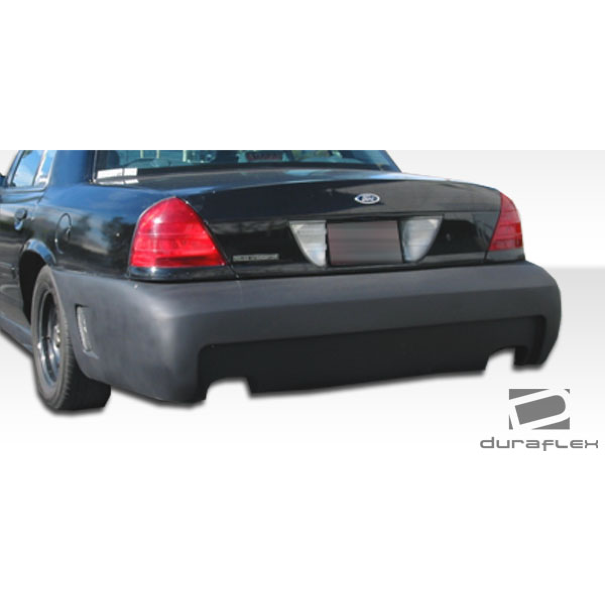 Modify your Ford Crown Victoria 1998 with our Exterior/Complete Body Kits - Rear view angle of the vehicle showing the bumper