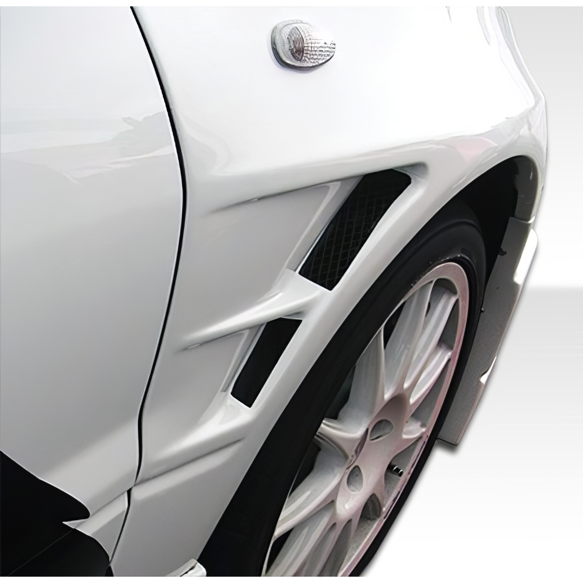 Modify your Mitsubishi Evolution 2003 with our Exterior/Fenders - Front fender at an angle of approximately 45 degrees