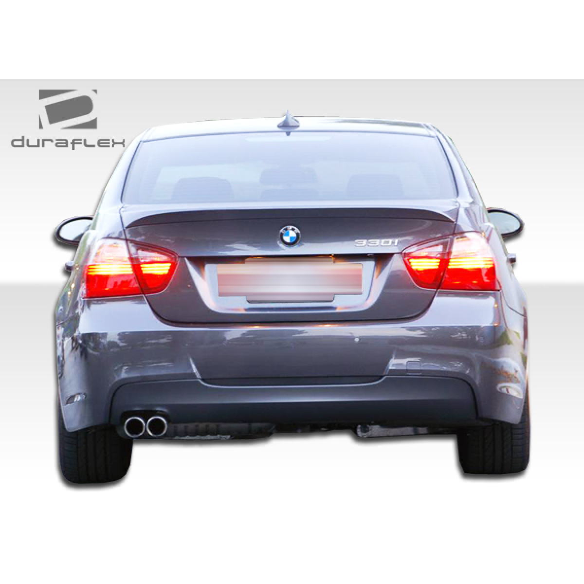 Modify your BMW 3-Series 2006 with our Exterior/Rear Bumpers or Lips - Rear view of the vehicle at a straight angle