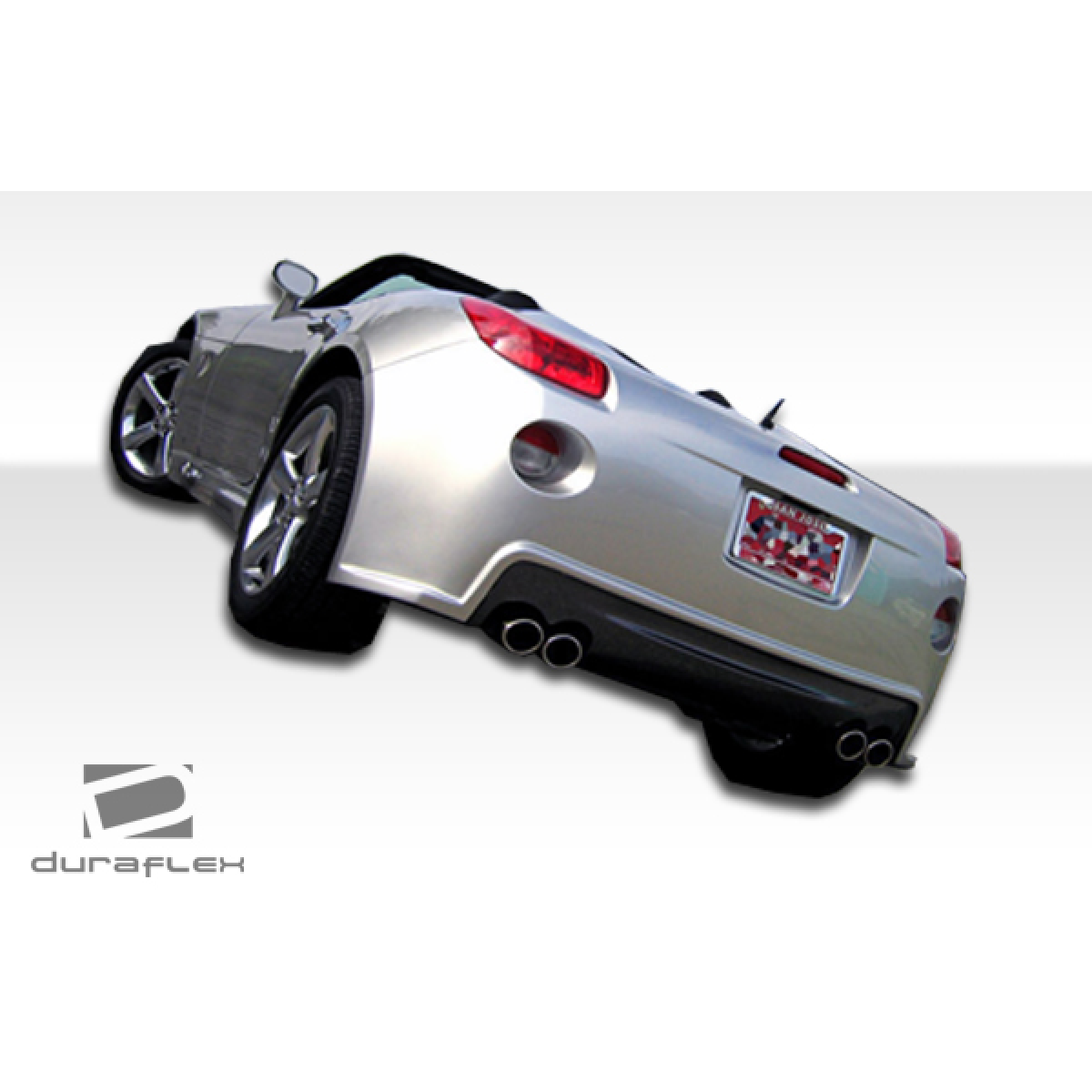 Modify your Pontiac Solstice 2006 with our Exterior/Side Skirts - View from a low rear angle showing side skirts