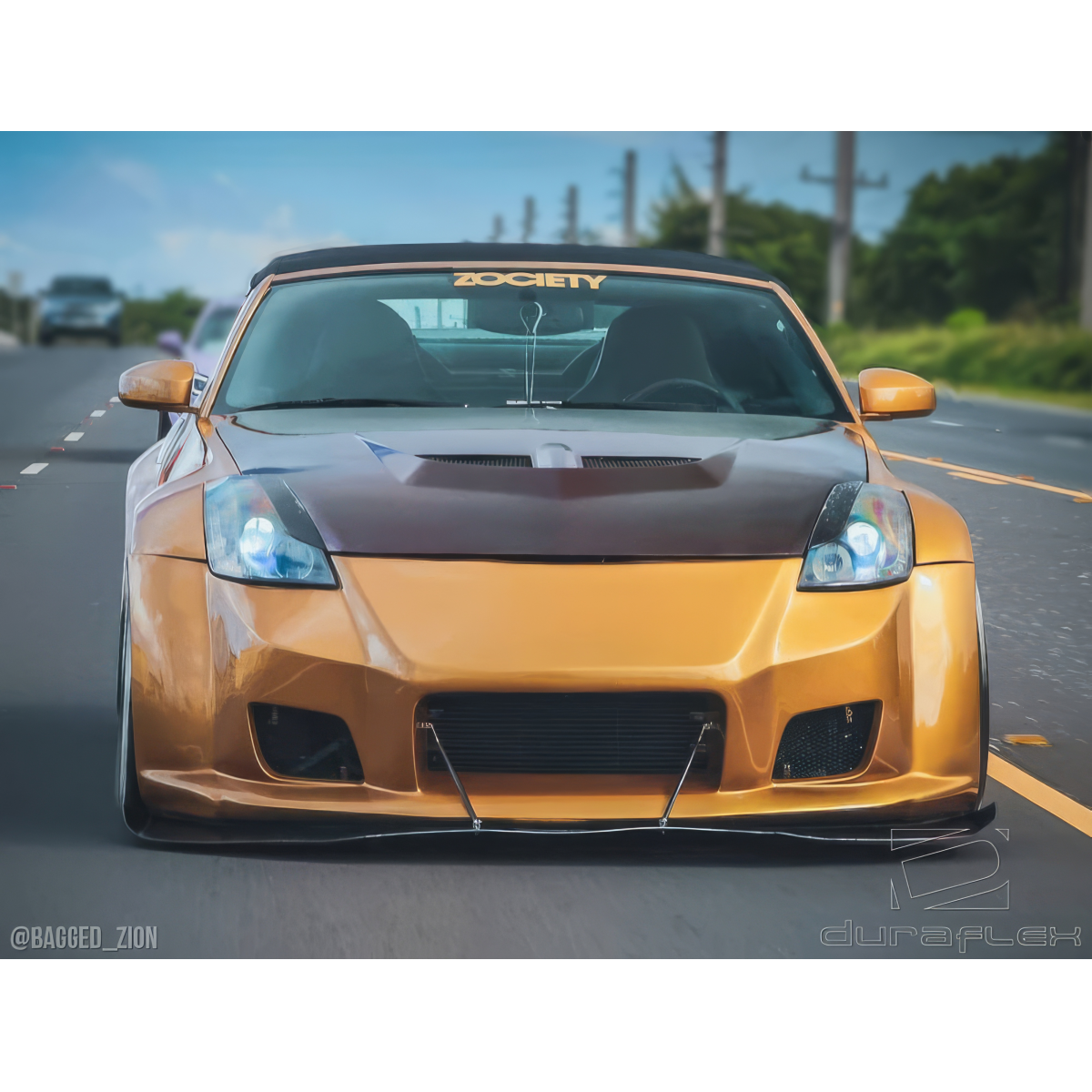 Modify your Nissan 350Z 2003 with our Exterior/Complete Body Kits - Front angle view of the Nissan 350Z